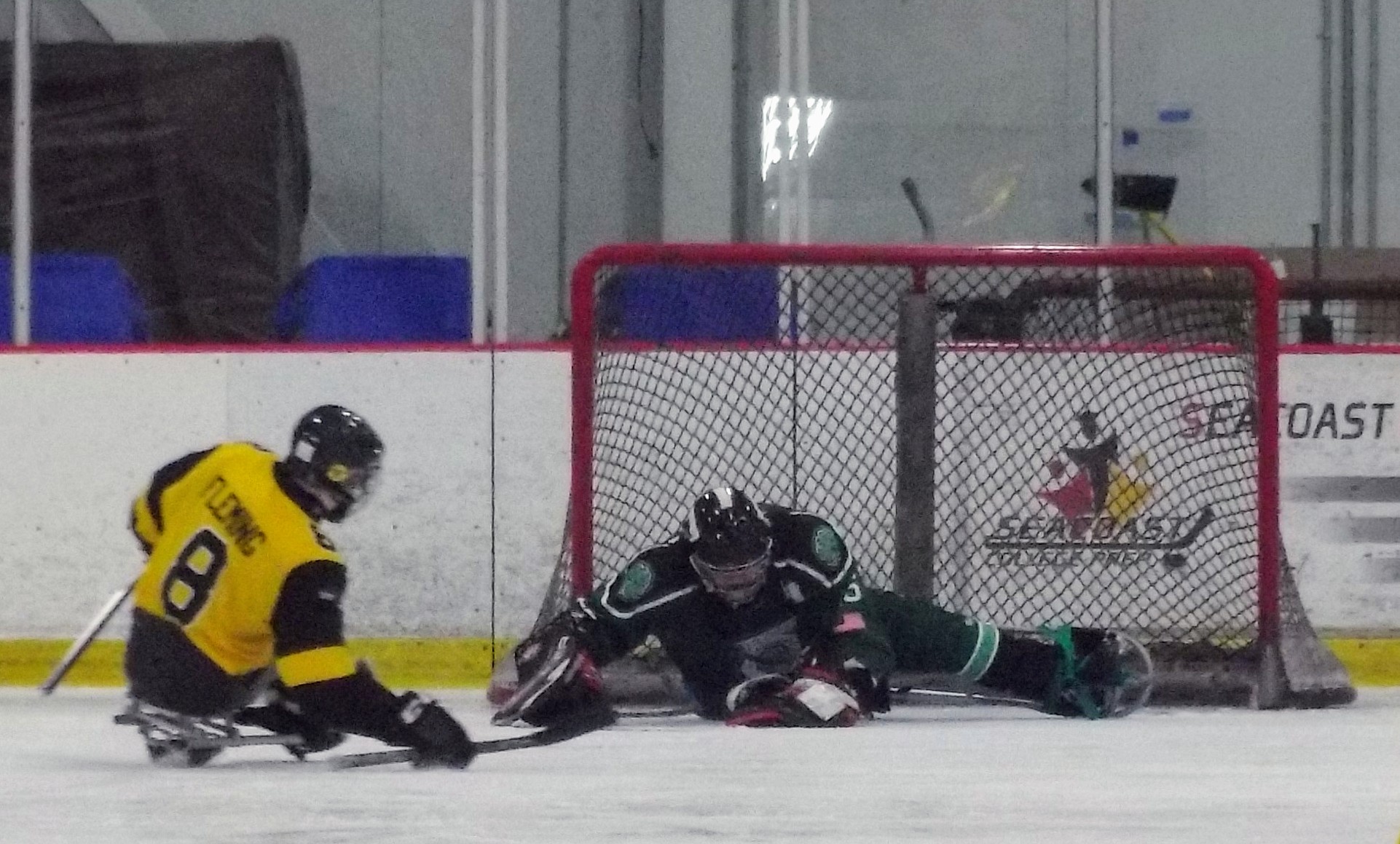 Mighty Penguins shot on goal saved by Shamrocks